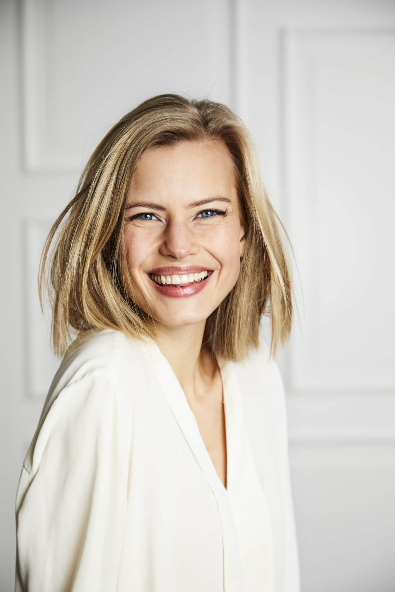 woman smiling after a smile makeover